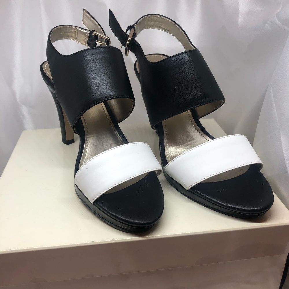 Black & white womens saddle with patent heel